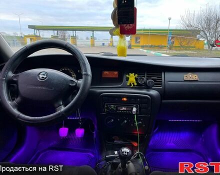 Зеленый Опель Вектра, объемом двигателя 18 л и пробегом 409 тыс. км за 2200 $, фото 11 на Automoto.ua
