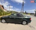 Зеленый Опель Вектра, объемом двигателя 1.8 л и пробегом 446 тыс. км за 2000 $, фото 1 на Automoto.ua