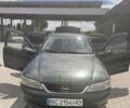 Зеленый Опель Вектра, объемом двигателя 1.8 л и пробегом 446 тыс. км за 2000 $, фото 7 на Automoto.ua