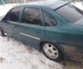 Зеленый Опель Вектра, объемом двигателя 2 л и пробегом 450 тыс. км за 900 $, фото 1 на Automoto.ua