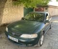 Зелений Опель Вектра, об'ємом двигуна 1.8 л та пробігом 285 тис. км за 1855 $, фото 9 на Automoto.ua
