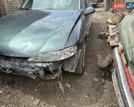 Зеленый Опель Вектра, объемом двигателя 1.8 л и пробегом 225 тыс. км за 1200 $, фото 3 на Automoto.ua