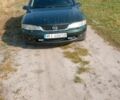 Зеленый Опель Вектра, объемом двигателя 2 л и пробегом 300 тыс. км за 898 $, фото 2 на Automoto.ua
