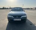 Зелений Опель Вектра, об'ємом двигуна 2 л та пробігом 285 тис. км за 1950 $, фото 1 на Automoto.ua