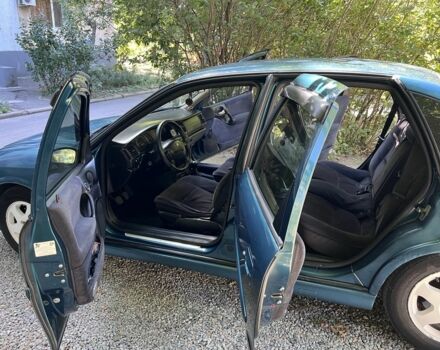 Зеленый Опель Вектра, объемом двигателя 2 л и пробегом 430 тыс. км за 2800 $, фото 1 на Automoto.ua