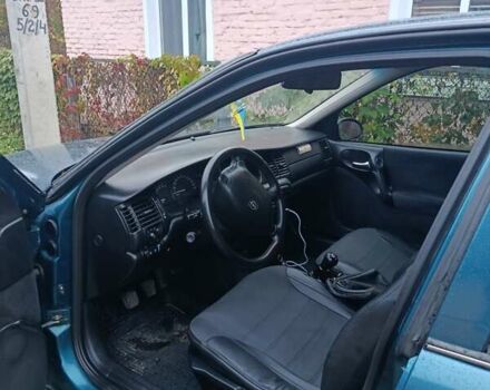 Зелений Опель Вектра, об'ємом двигуна 1.8 л та пробігом 285 тис. км за 2800 $, фото 1 на Automoto.ua