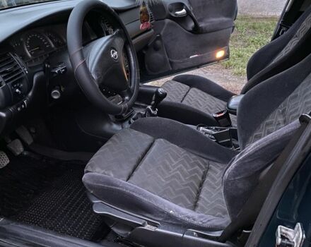 Зеленый Опель Вектра, объемом двигателя 1.8 л и пробегом 350 тыс. км за 1550 $, фото 7 на Automoto.ua