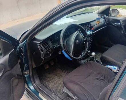 Зеленый Опель Вектра, объемом двигателя 1.6 л и пробегом 88 тыс. км за 2600 $, фото 9 на Automoto.ua