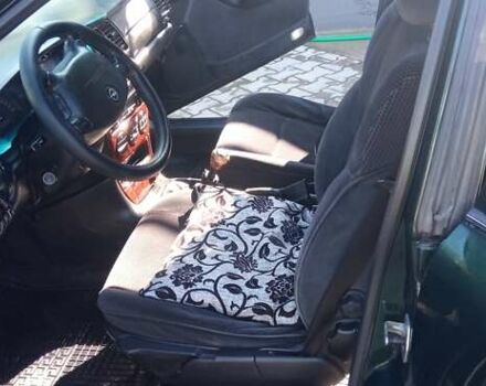 Зеленый Опель Вектра, объемом двигателя 2.2 л и пробегом 289 тыс. км за 3600 $, фото 12 на Automoto.ua