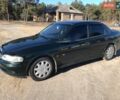 Зеленый Опель Вектра, объемом двигателя 2 л и пробегом 337 тыс. км за 3100 $, фото 1 на Automoto.ua