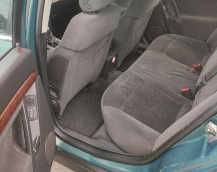 Зелений Опель Вектра, об'ємом двигуна 2 л та пробігом 333 тис. км за 2100 $, фото 14 на Automoto.ua