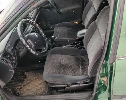 Зеленый Опель Вектра, объемом двигателя 1.6 л и пробегом 230 тыс. км за 1600 $, фото 5 на Automoto.ua