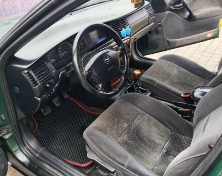 Зеленый Опель Вектра, объемом двигателя 1.8 л и пробегом 334 тыс. км за 2200 $, фото 7 на Automoto.ua