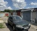 Зеленый Опель Вектра, объемом двигателя 1.8 л и пробегом 250 тыс. км за 2102 $, фото 1 на Automoto.ua