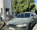 Зеленый Опель Вектра, объемом двигателя 2 л и пробегом 350 тыс. км за 702 $, фото 1 на Automoto.ua
