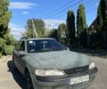 Зеленый Опель Вектра, объемом двигателя 2 л и пробегом 350 тыс. км за 702 $, фото 1 на Automoto.ua
