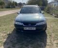 Зеленый Опель Вектра, объемом двигателя 2 л и пробегом 250 тыс. км за 1507 $, фото 4 на Automoto.ua