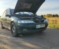 Зеленый Опель Вектра, объемом двигателя 2 л и пробегом 369 тыс. км за 1600 $, фото 4 на Automoto.ua