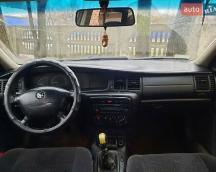 Зеленый Опель Вектра, объемом двигателя 2 л и пробегом 430 тыс. км за 50000 $, фото 1 на Automoto.ua