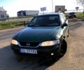 Зеленый Опель Вектра, объемом двигателя 20 л и пробегом 250 тыс. км за 1350 $, фото 3 на Automoto.ua