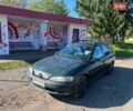 Зеленый Опель Вектра, объемом двигателя 2 л и пробегом 222 тыс. км за 1050 $, фото 1 на Automoto.ua
