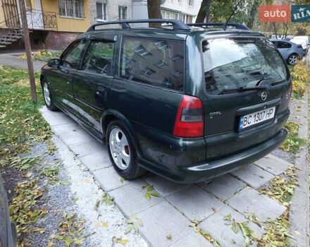 Зелений Опель Вектра, об'ємом двигуна 2.2 л та пробігом 306 тис. км за 1900 $, фото 2 на Automoto.ua