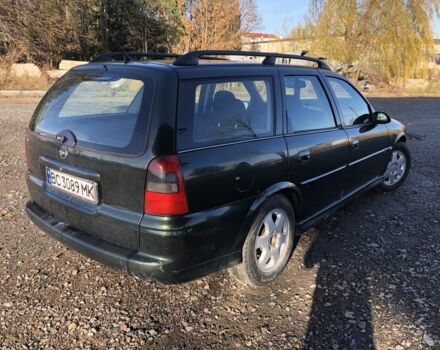 Зеленый Опель Вектра, объемом двигателя 1.8 л и пробегом 1000 тыс. км за 1800 $, фото 11 на Automoto.ua