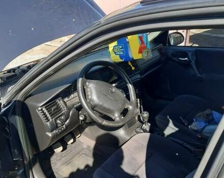 Зеленый Опель Вектра, объемом двигателя 2 л и пробегом 260 тыс. км за 3100 $, фото 2 на Automoto.ua