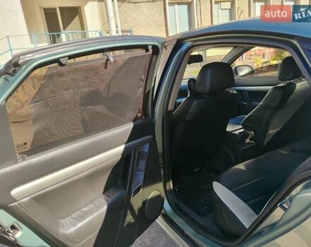 Зеленый Опель Вектра, объемом двигателя 1.9 л и пробегом 340 тыс. км за 3300 $, фото 19 на Automoto.ua