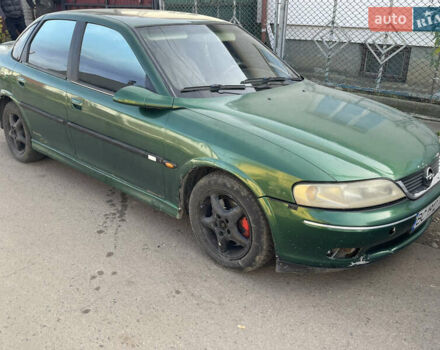 Зеленый Опель Вектра, объемом двигателя 2 л и пробегом 350 тыс. км за 1450 $, фото 1 на Automoto.ua