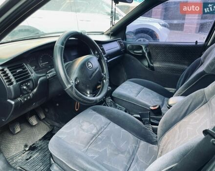 Зеленый Опель Вектра, объемом двигателя 1.8 л и пробегом 300 тыс. км за 950 $, фото 1 на Automoto.ua