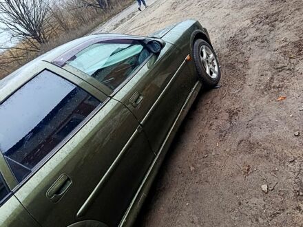 Зелений Опель Вектра, об'ємом двигуна 1.6 л та пробігом 300 тис. км за 2950 $, фото 1 на Automoto.ua