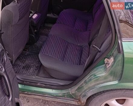 Зеленый Опель Вектра, объемом двигателя 1.8 л и пробегом 387 тыс. км за 2000 $, фото 1 на Automoto.ua