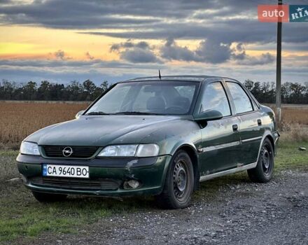 Зеленый Опель Вектра, объемом двигателя 1.8 л и пробегом 344 тыс. км за 1650 $, фото 1 на Automoto.ua