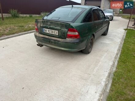 Зеленый Опель Вектра, объемом двигателя 2 л и пробегом 350 тыс. км за 1450 $, фото 1 на Automoto.ua