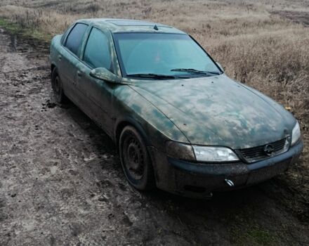 Зеленый Опель Вектра, объемом двигателя 1.8 л и пробегом 169 тыс. км за 400 $, фото 1 на Automoto.ua