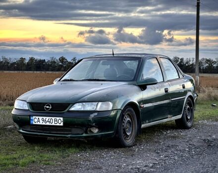 Зеленый Опель Вектра, объемом двигателя 1.8 л и пробегом 344 тыс. км за 1650 $, фото 1 на Automoto.ua