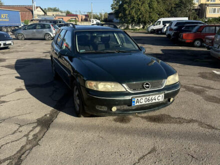 Зеленый Опель Вектра, объемом двигателя 2 л и пробегом 327 тыс. км за 3000 $, фото 1 на Automoto.ua