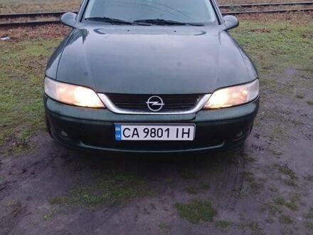 Зеленый Опель Вектра, объемом двигателя 1.8 л и пробегом 1000 тыс. км за 2500 $, фото 1 на Automoto.ua