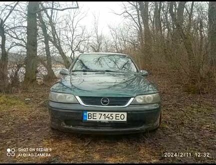 Зеленый Опель Вектра, объемом двигателя 2.5 л и пробегом 470 тыс. км за 2100 $, фото 1 на Automoto.ua