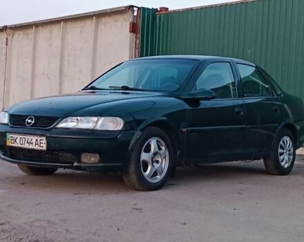 Зеленый Опель Вектра, объемом двигателя 1.8 л и пробегом 258 тыс. км за 1750 $, фото 1 на Automoto.ua