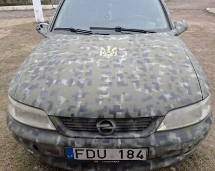 Зеленый Опель Вектра, объемом двигателя 2 л и пробегом 400 тыс. км за 1399 $, фото 1 на Automoto.ua