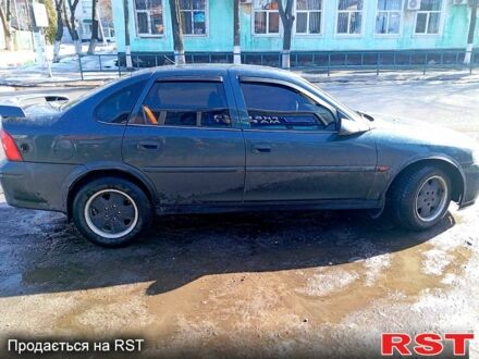 Зеленый Опель Вектра, объемом двигателя 2 л и пробегом 301 тыс. км за 2800 $, фото 1 на Automoto.ua