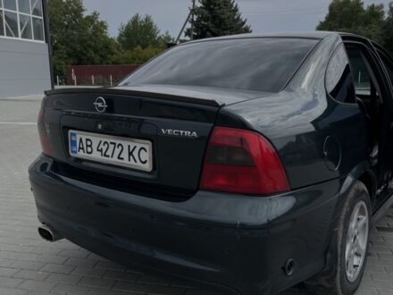 Зеленый Опель Вектра, объемом двигателя 2.2 л и пробегом 247 тыс. км за 3900 $, фото 1 на Automoto.ua