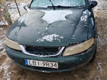 Зеленый Опель Вектра, объемом двигателя 2 л и пробегом 300 тыс. км за 900 $, фото 1 на Automoto.ua
