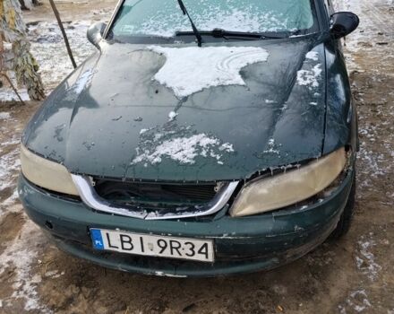 Зеленый Опель Вектра, объемом двигателя 2 л и пробегом 300 тыс. км за 900 $, фото 1 на Automoto.ua
