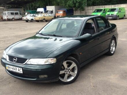 Зеленый Опель Вектра, объемом двигателя 2 л и пробегом 260 тыс. км за 3300 $, фото 1 на Automoto.ua