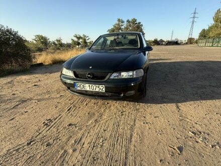 Зелений Опель Вектра, об'ємом двигуна 2 л та пробігом 300 тис. км за 1201 $, фото 1 на Automoto.ua