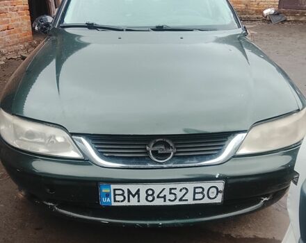 Зеленый Опель Вектра, объемом двигателя 1 л и пробегом 290 тыс. км за 850 $, фото 1 на Automoto.ua