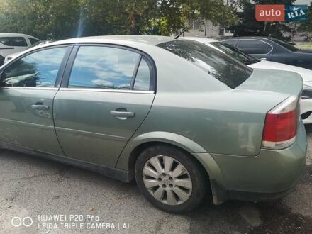 Зеленый Опель Вектра, объемом двигателя 2.2 л и пробегом 252 тыс. км за 6000 $, фото 1 на Automoto.ua